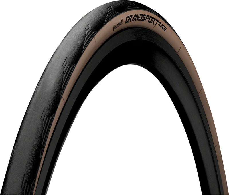 Load image into Gallery viewer, Continental Grand Sport Race Tire - 700 x 28 Clincher Folding BLK/Brown PureGrip NyTech Breaker